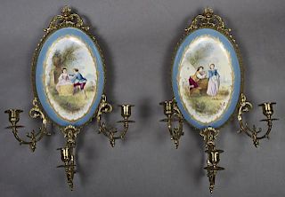 Pair of French Limoges Porcelain and Bronze Three Light Wall Sconces, early 20th c., by Bernardaud & Cie, each with a bronze 