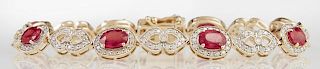 14K Yellow Gold Link Bracelet, with eight oval links with a central oval ruby atop a frame of tiny round diamonds, joined by 