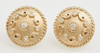 Pair of 14K Yellow Gold Circular Earrings, the domed tops with central round diamonds flanked by relief swirled decoration, m