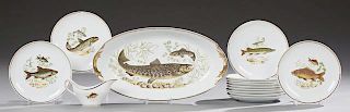 French Fourteen Piece Porcelain Fish Set, 20th c., by Porcelaire d'Aquitaine, consisting of twelve plates, an oval platter an