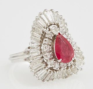 Lady's 14K White Gold Dinner Ring, with a central 1.77 carats pear shaped ruby within a border of round diamonds and an undul