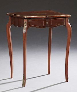 French Brass Inlaid Mahogany Louis XV Style Work Table, late 19th c., the Boulle inlaid brass banded lid opening to a divided