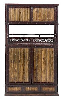 A Chinese Hardwood and Bamboo Display Cabinet, Height 66 x width 38 1/4 x depth 15 1/4 inches.