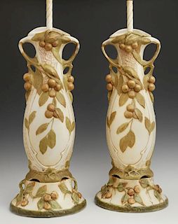 Pair of Royal Dux Style Earthenware Vases, c. 1900, with applied leaf, berry and floral decoration, now mounted as lamps, H.-