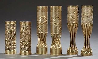 Group of Six Brass Trench Art Cases, c. 1918, consisting of a pair of tall crimped examples with floral repousse decoration; 