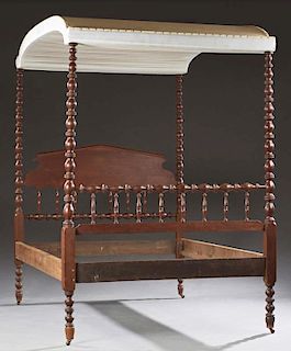 American Carved Mahogany Jenny Lind Tester Bed. c. 1900, the arched tester on spool turned posts flanking a peaked spindle he
