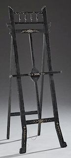 American Ebonized Aesthetic Adjustable Easel, c. 1880, with incised painted floral decoration, H.- 55 in., W.- 20 3/4 in., Op