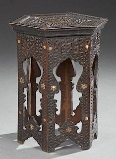 Moroccan Mother-of-Pearl Inlaid Tabouret, early 20th c., the hexagonal top over sides with arched cutouts, H.- 21 in., Dia.- 