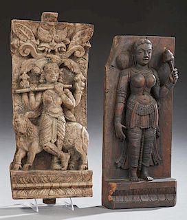Two Hindu Carved Wooden Figural Panels, early 20th c., of female deities, larger- H.- 18 in., W.- 8 3/8 in., D.- 2 5/8 in.
