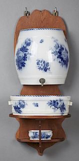 English Ironstone Lavabo, 19th c., in the "Aremone" pattern, consisting of a reservoir with spigot, a basin and a soap dish, 