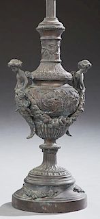 Louis XV Style Patinated Bronze Urn Lamp, late 20th c., the sides with winged putto handles, on a circular socle support to a