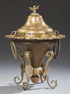 Moroccan Brass Brazier, early 20th c., the lid with an eagle handle over a scalloped top hung with large ring handles, on fou