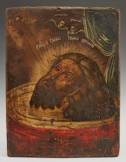 Russian Icon of the Head of John the Baptist, 19th c., oil on curved wooden panel, H.- 12 1/4 in., W.- 9 1/4 in.