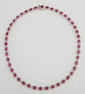 14K White Gold Link Necklace, each of the forty-five oval links with an oval natural ruby atop a border of tiny round diamond