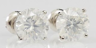 Pair of 14K White Gold Diamond Stud Earrings, each with a 3.11 carat round diamond, with appraisal.