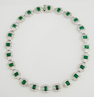 18K White Gold Art Deco Style Link Necklace, each of the twenty-four elaborate links with a central emerald atop a geometric 