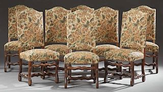 Set of Eight Louis XIII Style Carved Beech Dining Chairs, 19th c., the arched high backs over trapezoidal seats, on cabriole 