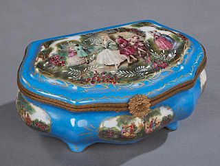 Sevres Style Porcelain and Brass Dresser Box, 20th c., with a blue ground, the domed lid with a transfer reserve of couples i