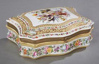 Sevres Style Porcelain Dresser Box, 20th c., of lobed form with a pale ocher ground, the domed lid with a painted reserve of 