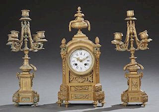 French Three Piece Louis XVI Style Bronze Clock Set, late 19th c., by Japy Freres, the time and strike clock with an arched t