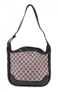 A Gucci Blue Monogram Shoulder Bag, 11" x 9.5" x 3"; Strap drop: 10".