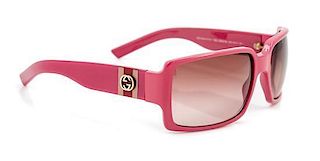 A Pair of Gucci Pink Framed Sunglasses,