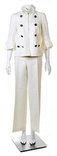 A Carolina Herrera Cream Linen Pant Suit, Jacket size small, Pant size 8.