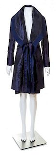A Salvatore Ferragamo Navy Coat and Skirt Ensemble, Jacket size 38, Skirt size 46.