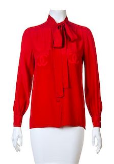 A Chanel Red Silk Blouse, No size.