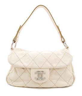 A Chanel Cream Leather Wild Stitch Shoulder Bag, 12" x 8" x 3.5"; Handle drop: 8.5".