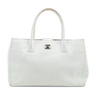 A Chanel White Caviar Tote Bag, 13.3" x 10" x 5.5"; Handle drop: 6.5".