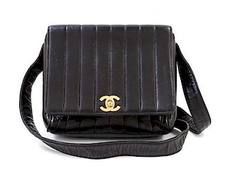A Chanel Black Lambskin Vertical Quilt Flap Shoulder Bag, 7.5" x 7" x 2". Strap drop: 19".