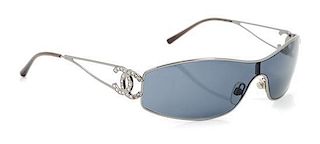 A Pair of Chanel Silver Frame Sunglasses,