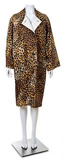 A Givenchy Silk Leopard Print Trench Coat, No size.