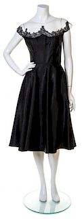 A Peggy Hunt Black Silk Cocktail Dress, No size.