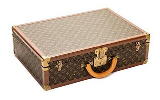 A Louis Vuitton Monogram Canvas Bisten 60 Suitcase, 23.6" x 16.5" x 7.1".