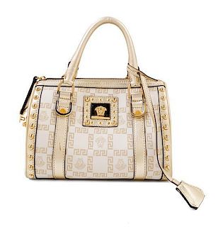 * A Versace Metallic and Cream Monogram Handbag, 9.5" x 7" x 6"; Strap drop: 4".