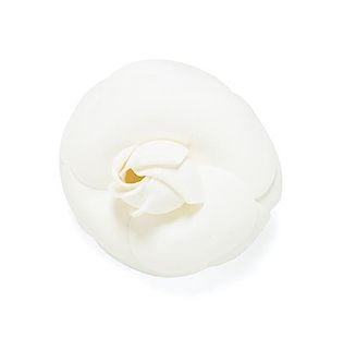 A Chanel White Camellia Pin, 3.5" circumference.