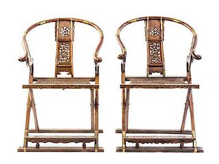 A Pair of Huanghuali Folding Chairs, Height 41 3/4 x width 27 1/2 x depth 24 3/4 inches.