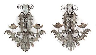 A Pair of Continental Patinated Metal Two-Light Wall Sconces Height 19 1/2 inches.