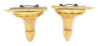 A Pair of Continental Carved and Gilt Painted Wood Wall Brackets Height 9 1/2 x width 9 x depth 9 inches.