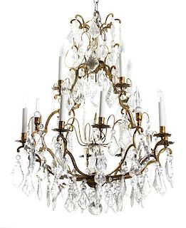 A Louis XV Style Bronze and Colorless Glass Twelve-Light Chandelier Diameter 26 inches.