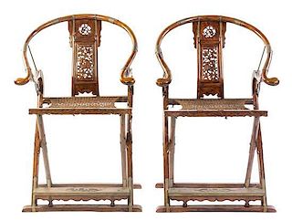 A Pair of Jichimu and Mixed Wood Horseshoe-Back Folding Chairs, Height 46 3/4 x width 29 3/4 x depth 24 1/4 inches.