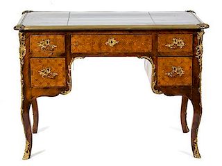 A Louis XV Style Gilt Bronze Mounted Parquetry Writing Desk Height 30 1/2 x 41 1/2 x diameter 23 inches.