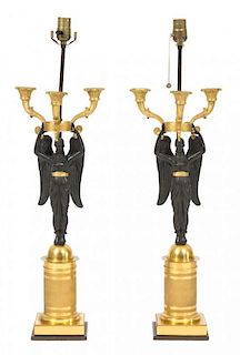 A Pair of French Empire Bronze and Gilt Bronze Figural Candelabra Height 30 inches.