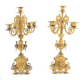 A Pair of French Regency Style Bronze Six-Light Candelabra Height 20 x diameter 10 inches.