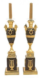 A Pair of French Empire Style Bronze and Gilt Bronze Candlesticks Height 15 inches.