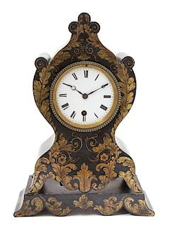 A Continental Ebonized and Gilt Decorated Tole Bracket Clock Height 13 3/4 inches.