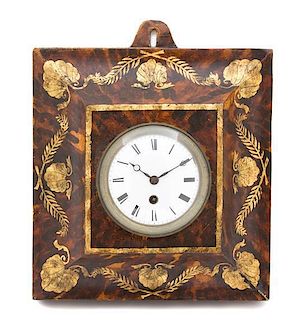A French Empire Style Faux-Tortoise Shell and Gilt Decorated Tole Wall Clock Height 13 inches x width 11 1/4 inches.