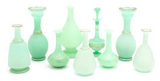 A Collection of Pale Green Opaline Glass Height of tallest 9 inches.